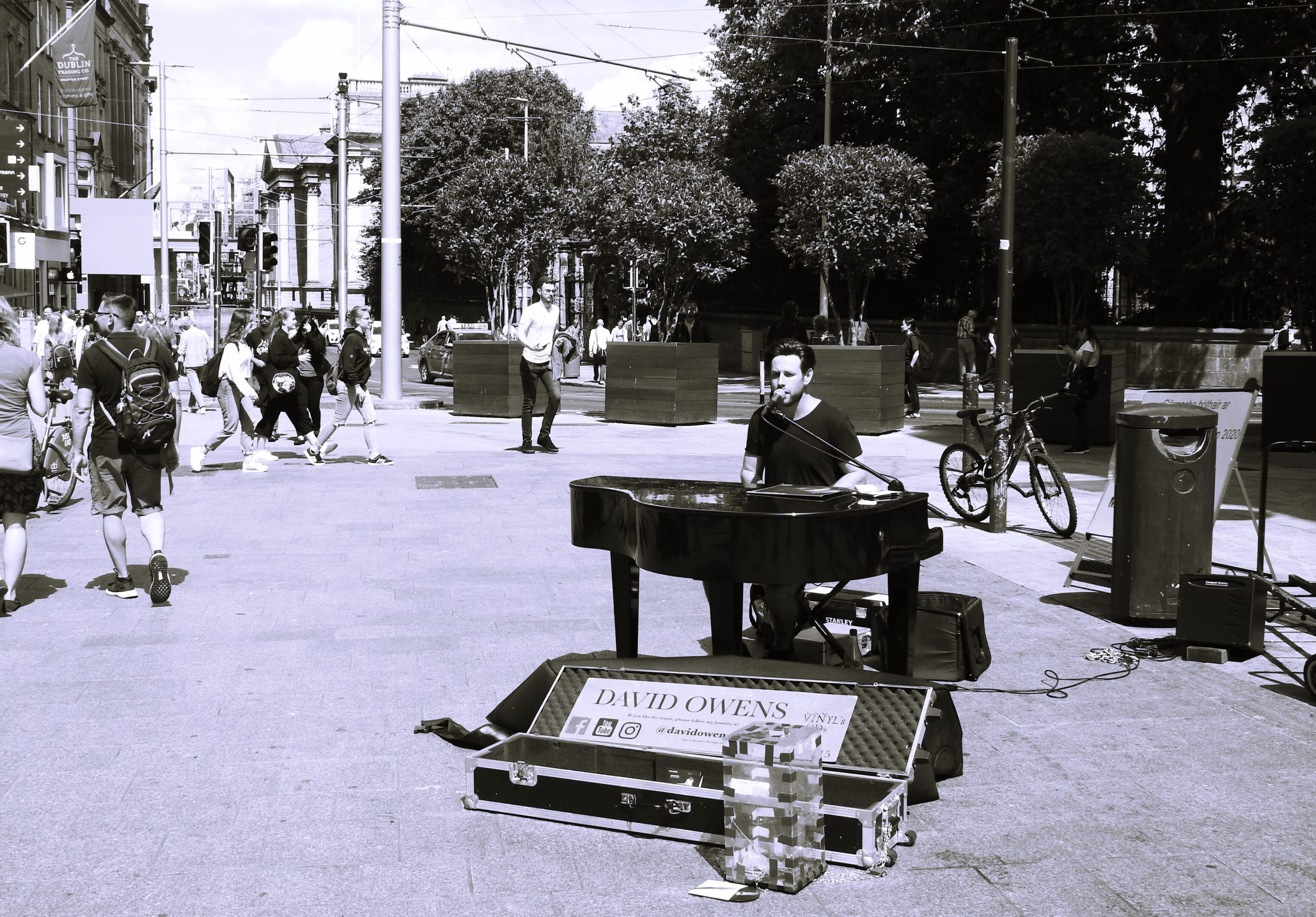 26th July 2019, Dublin, Ireland. Busker playing the piano on Grafton Street, Dublin city centre in the summer.